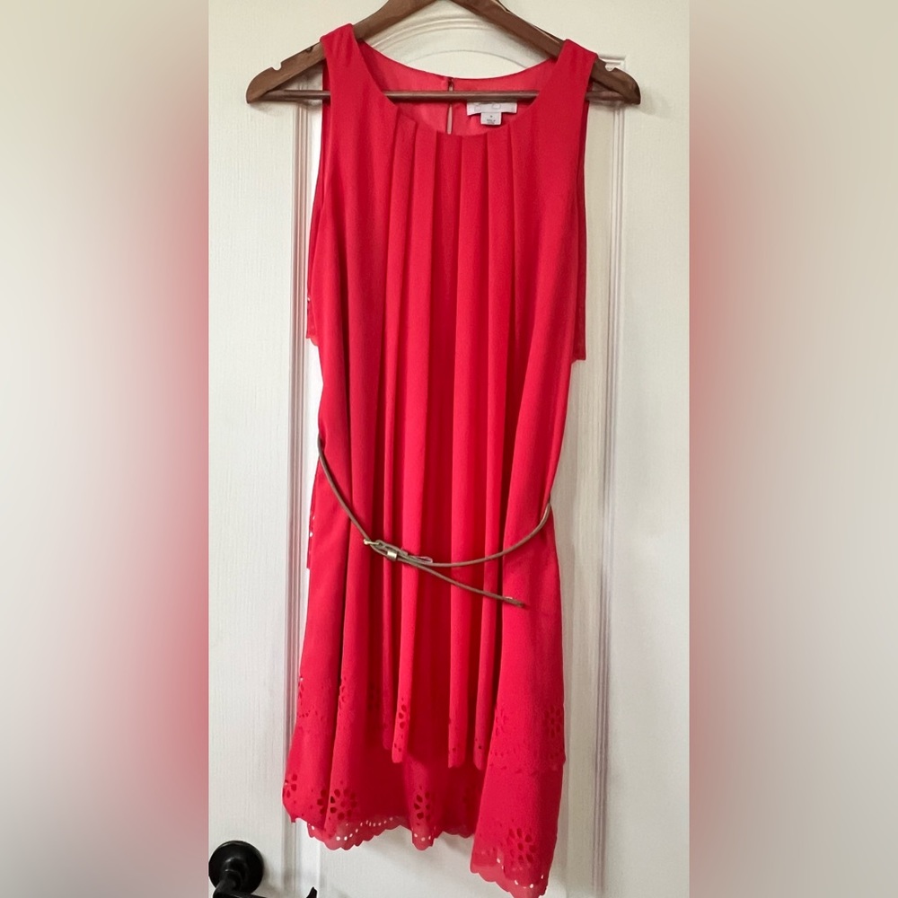 Coral Jessica Simpson knee length dress,eyelet detail at bottom with gold belt.
